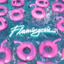 Inflatable flamingo buoys floating on turquoise water with the text "Flamingosis".